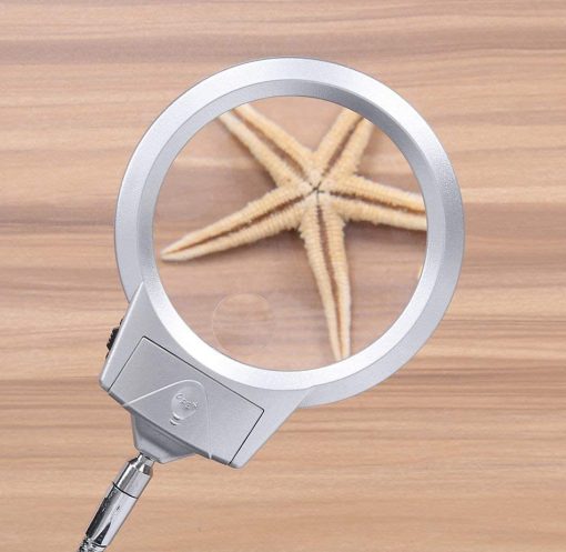 magnifying glass on stand with lights